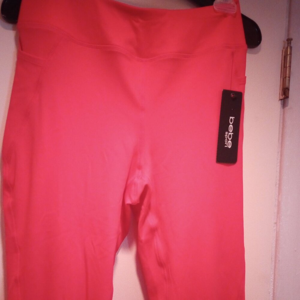 BeBe sport pants Hibiscus Color size S Brand New with tags!